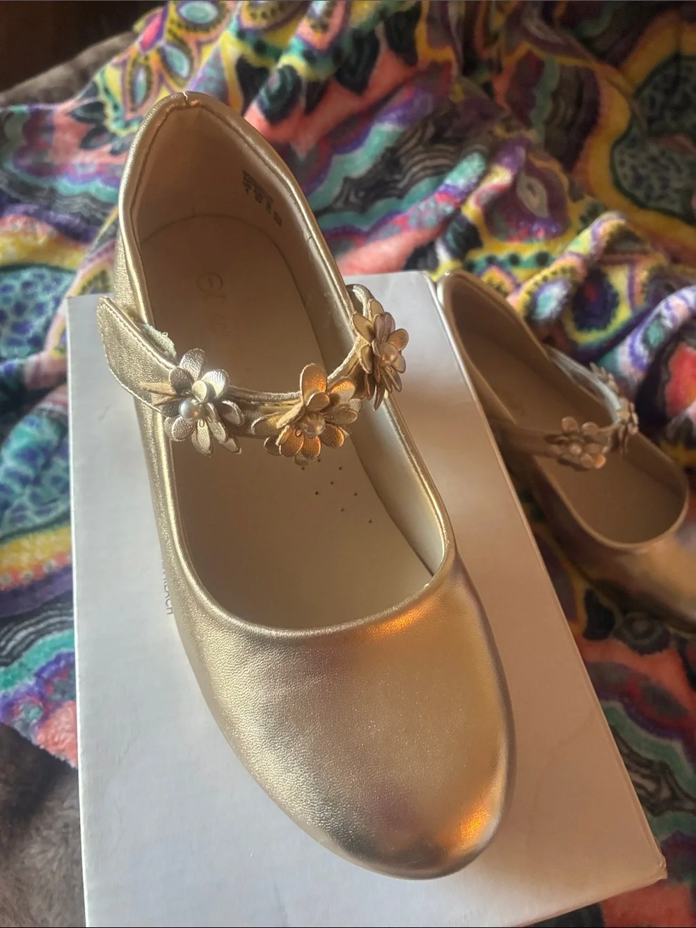 Little girl’s dream pairs gold heals size 1